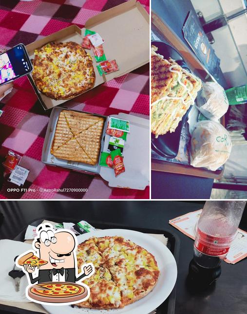 Get pizza at The Hawkers VEG