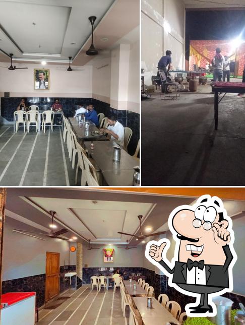 Take a seat at one of the tables at Choudhary Beetan Vaishno Dhaba