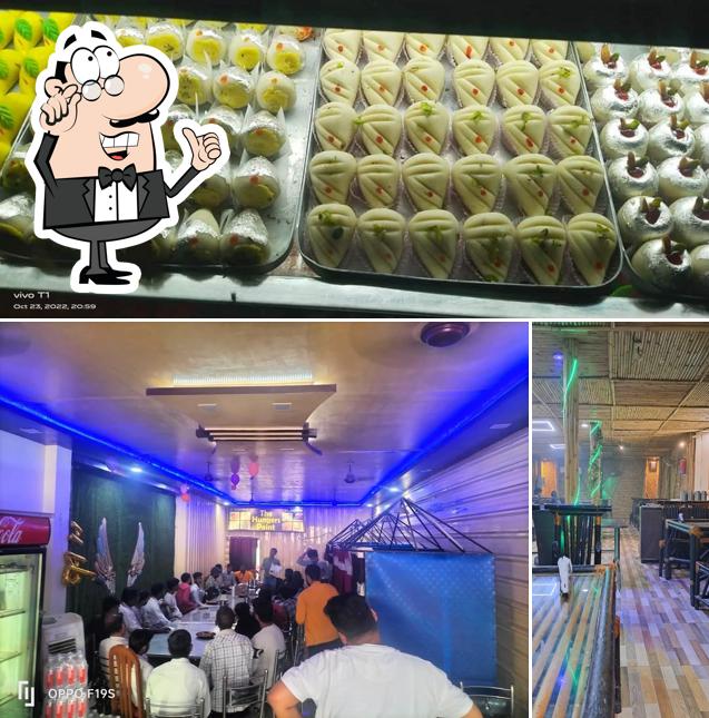 This is the photo showing interior and food at Dixit Sweets & Resturant