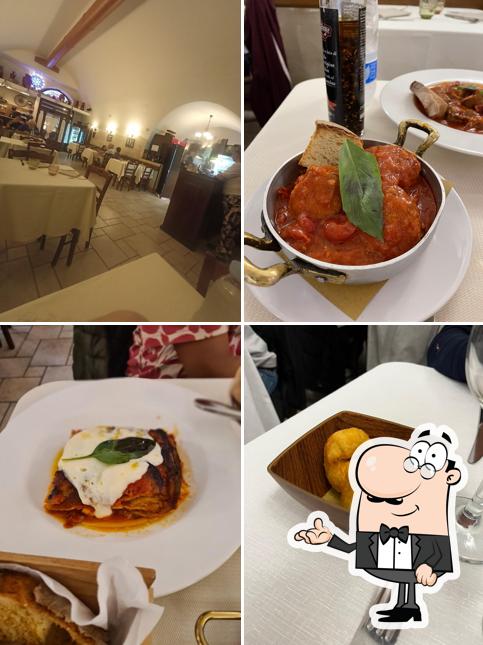 Siediti a un tavolo di Trattoria Lucana