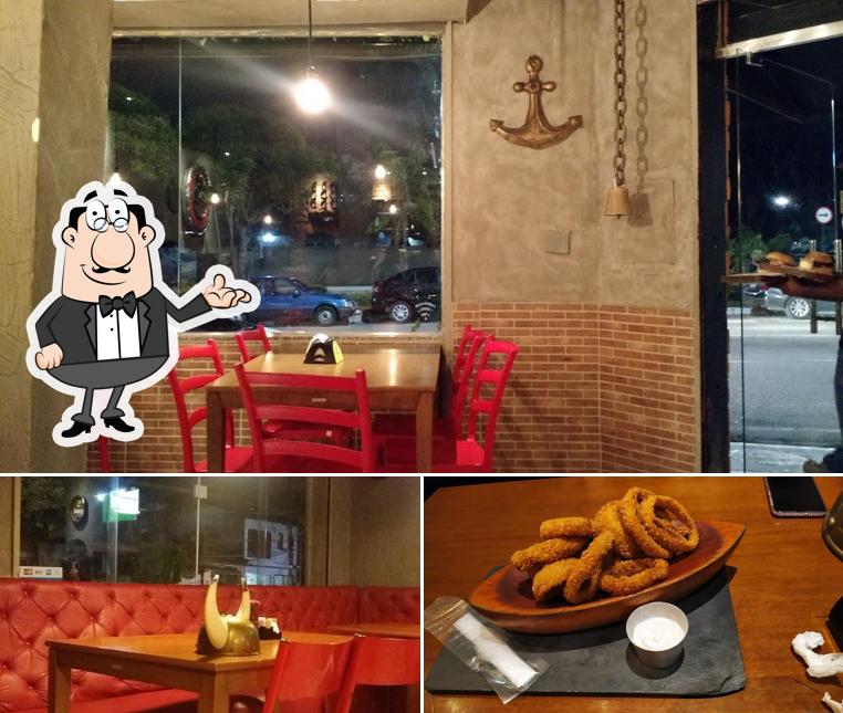 A foto do Vikings Burger - Duques de Caxias’s interior e comida