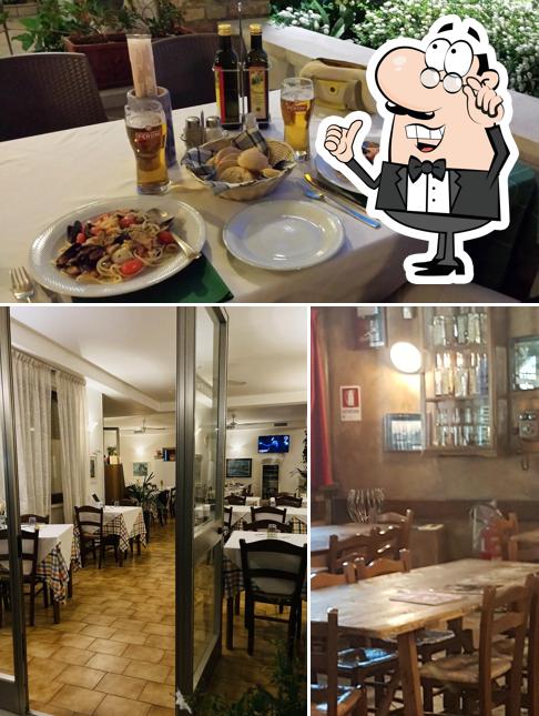 Dai un'occhiata agli interni di Pizzeria trattoria la rotonda
