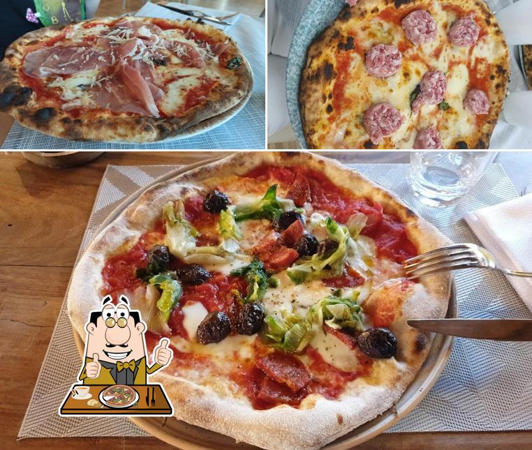 A Pizzeria Damm A Trà Di Romentino, puoi ordinare una bella pizza