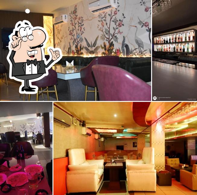 Take a seat at one of the tables at Bar Cloud9 & Lounge