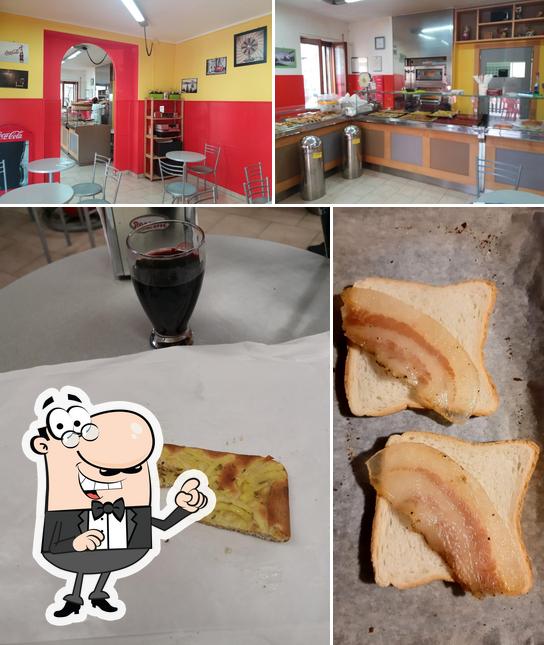 La immagine di interni e cibo da Pizzeria Graziani Stefano