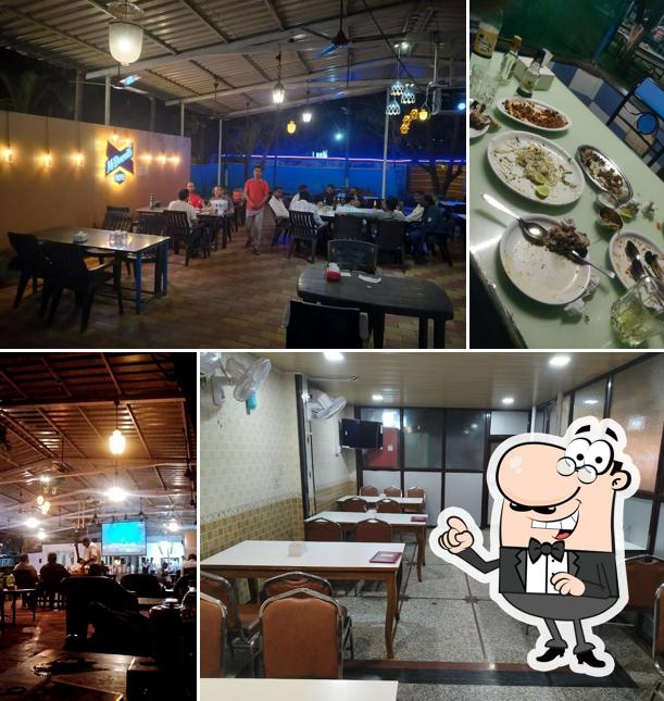 Take a seat at one of the tables at Hotel Royal Ambience