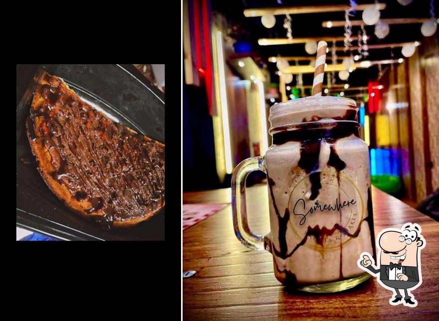 Take a seat at one of the tables at Somewhere cafe