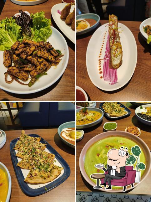 Take a seat at one of the tables at The Rasoiya Street