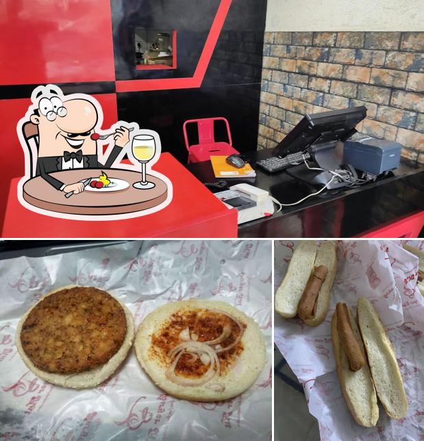 Check out the picture showing food and interior at Burger Hut