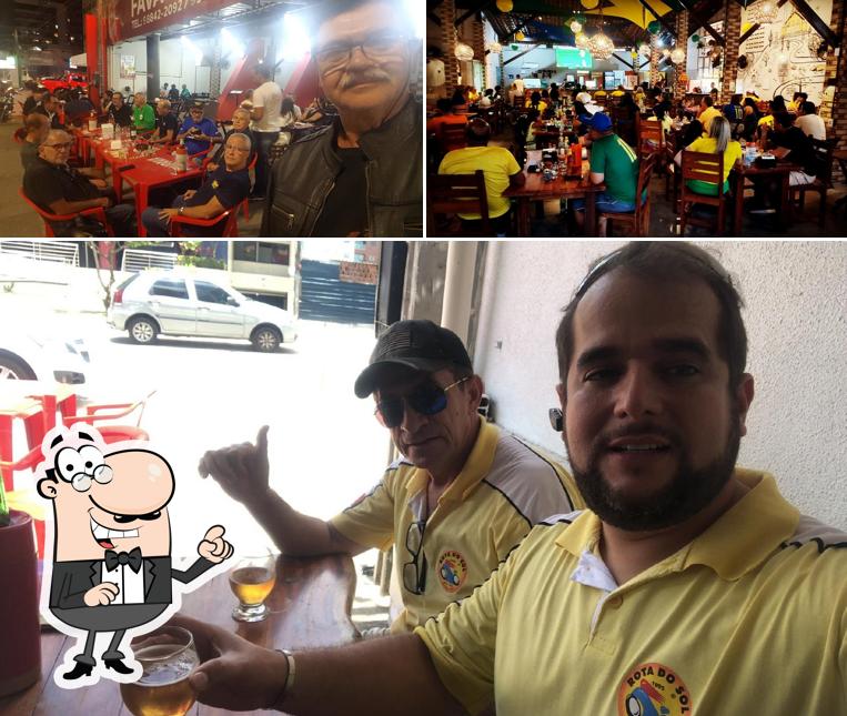Veja imagens do interior do Fava Praia Bar