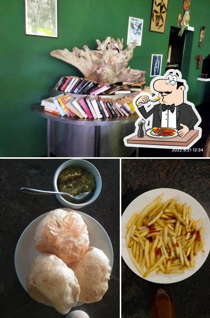 Take a look at the photo showing food and interior at Natesh Cafe