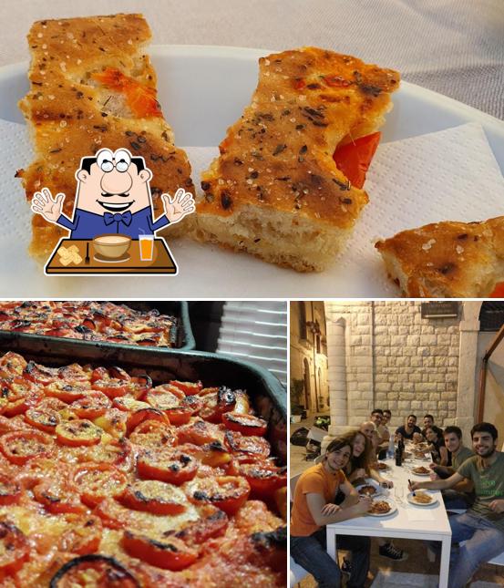 Dai un’occhiata alla foto che raffigura la cibo e tavolo da pranzo di Pizzeria - Osteria BUCA NAVARRA - Trani