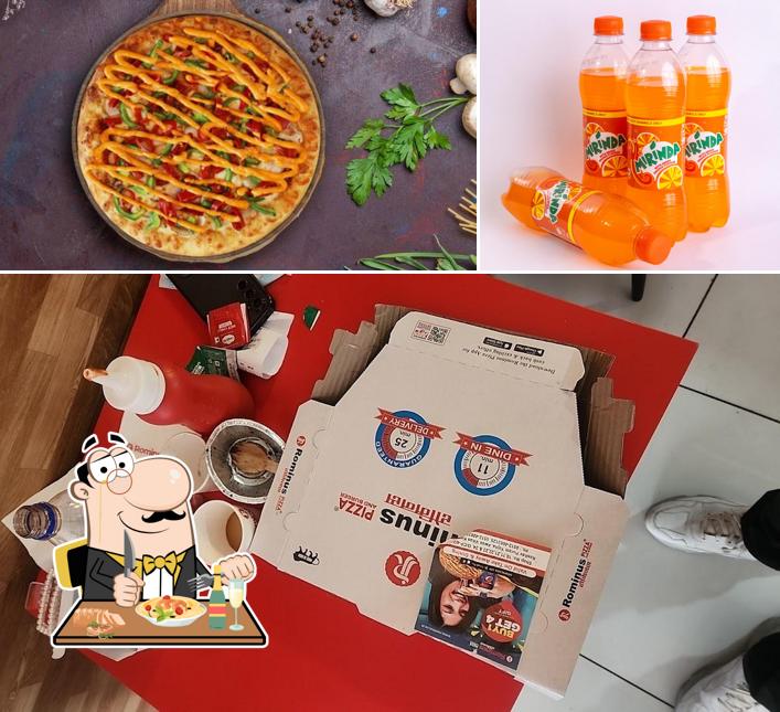 Take a look at the image depicting food and beverage at Rominus Pizza and Burger