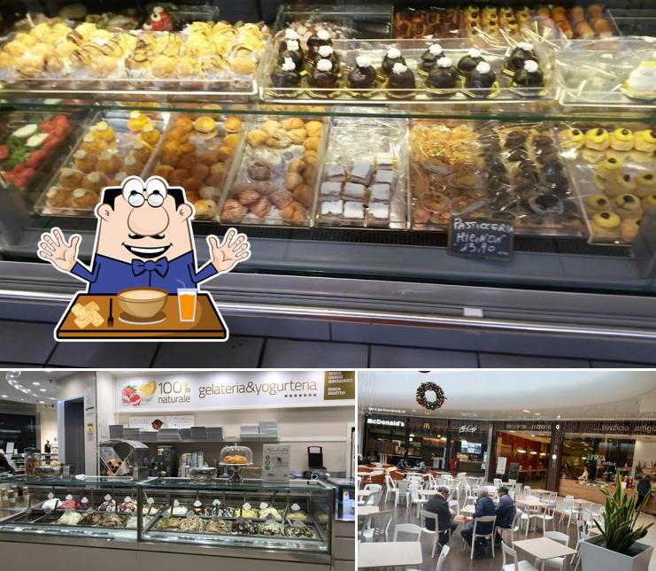Questa è la immagine che mostra la cibo e interni di Centro Commerciale La Cartiera