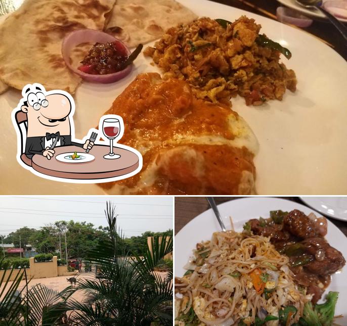 The picture of food and exterior at Hotel Suraj Palace