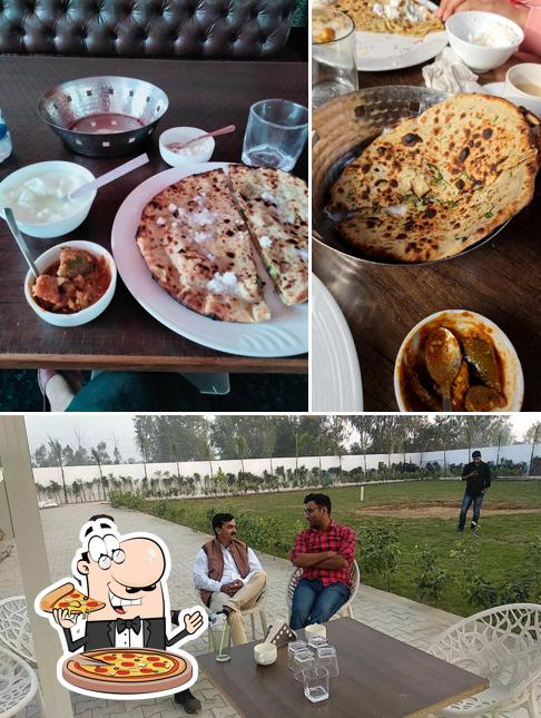 Get pizza at New Green Palmz