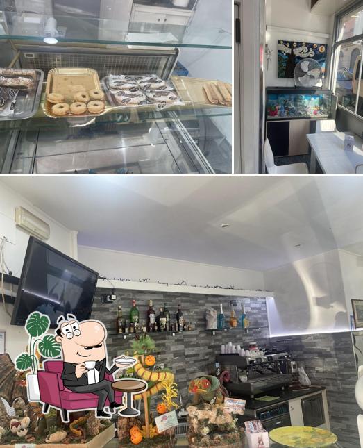 Dai un'occhiata agli interni di Bar Giulia