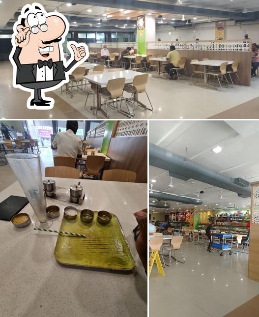 The interior of Madhava Multi-Cuisine Veg Restaurant