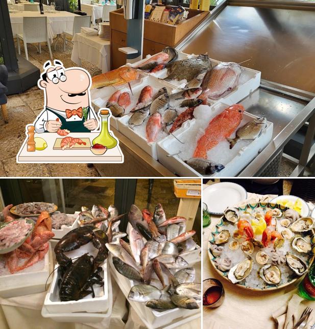 Ordina tra i molti pasti di mare offerti a Al Pescatore