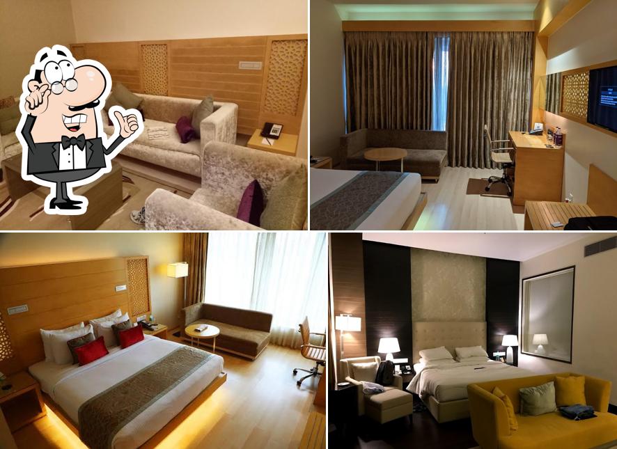 Take a seat at one of the tables at Sayaji Hotel Raipur Take a seat at one of the tables at Sayaji Hotel Raipur