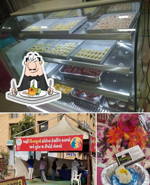 Check out the picture displaying food and interior at Kolkata Taste