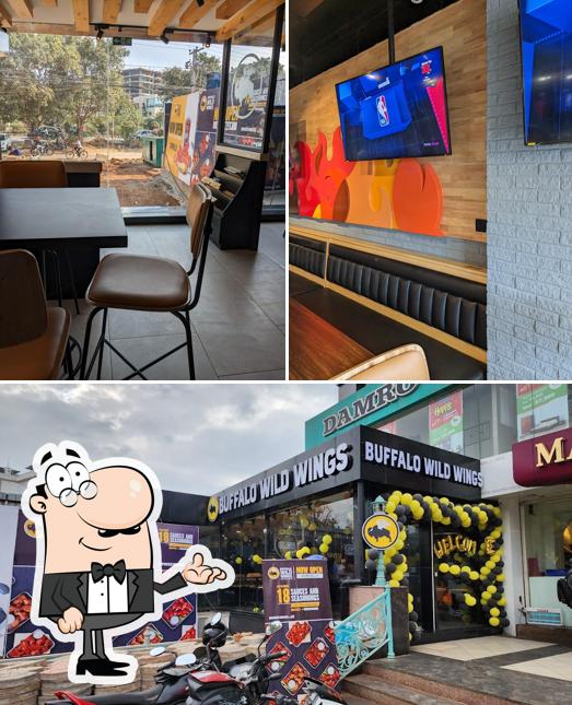 Take a look at the picture showing interior and exterior at Buffalo Wild Wings (BWW Kompally)
