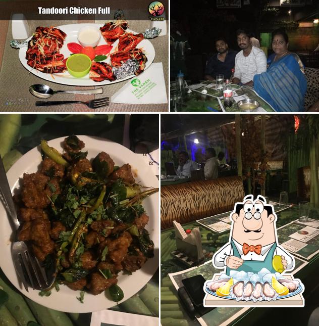 Get seafood at The Vanam Multi Cuisine Theme Restaurant
