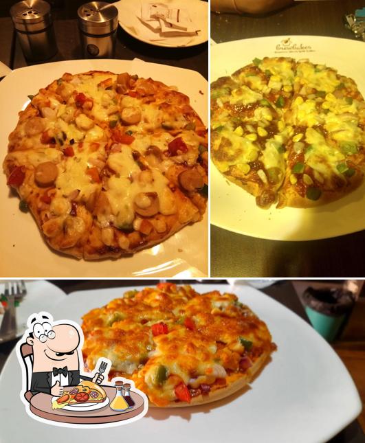 Get pizza at Leaf 'n Beans Cafe