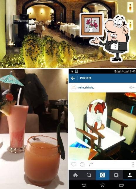 Take a look at the image displaying interior and beverage at The Creek