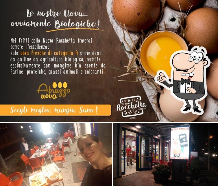 Questa è la immagine che mostra la interni e cibo di Pizzeria La Nuova Rocchetta