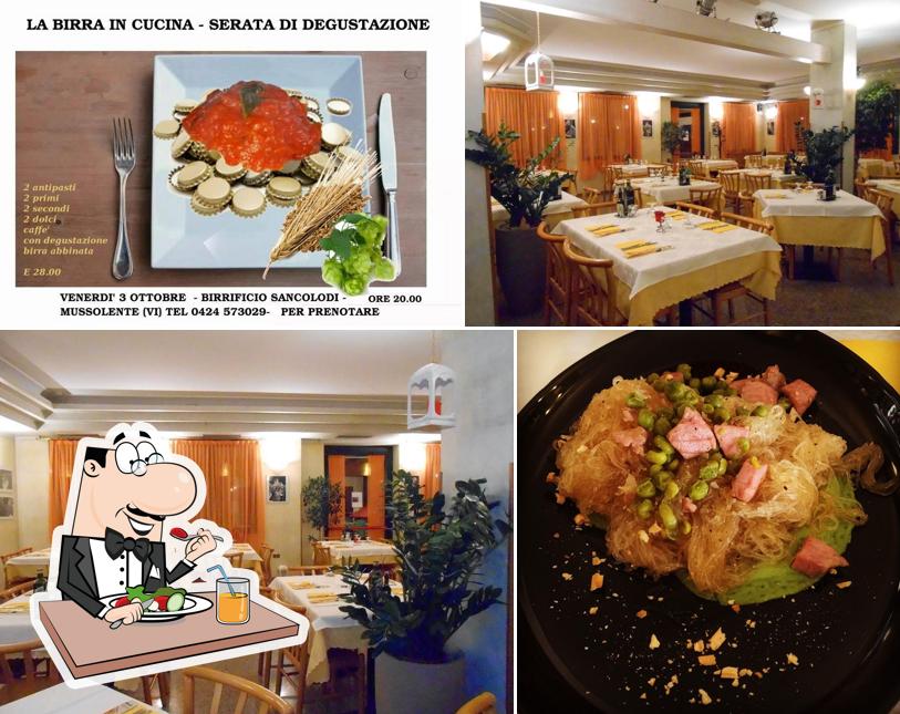 Pizzeria Birrificio Ristorante Sancolodi si caratterizza per la cibo e tavolo da pranzo