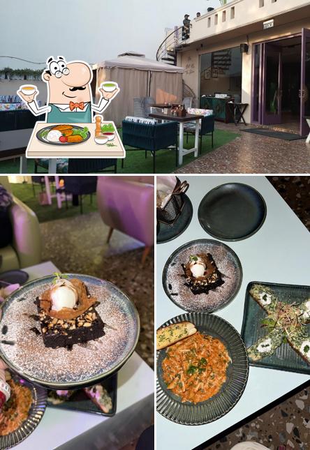 Among various things one can find food and interior at At Live Noida