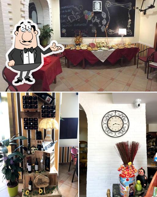 Questa è la foto che mostra la interni e vino di Gatto Fuori Bar Restaurant