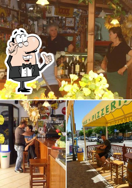 Questa è la immagine che mostra la interni e bancone da bar di Pizzeria Le Botti