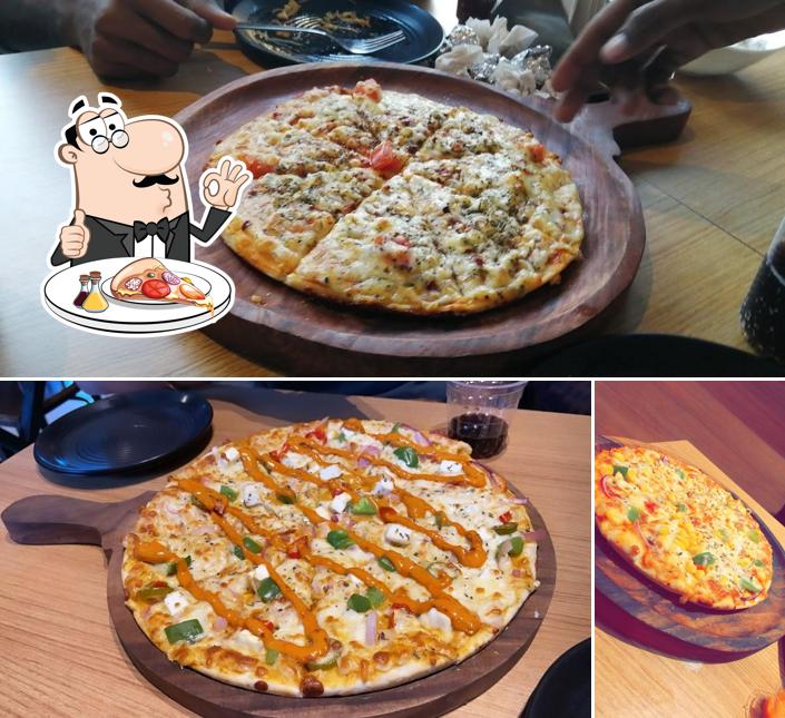Try out pizza at Yummy Eatz