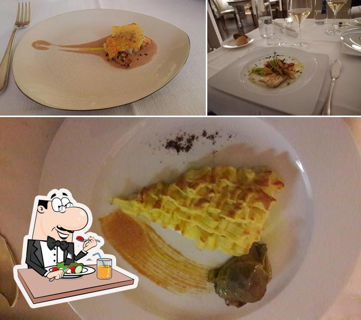 Tra le diverse cose da Ristorante Emilio si possono trovare la cibo e tavolo da pranzo
