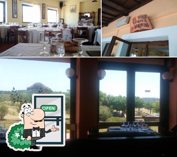 La foto della esterno e tavolo da pranzo di Su Nuraxi Agriturismo-Hotel