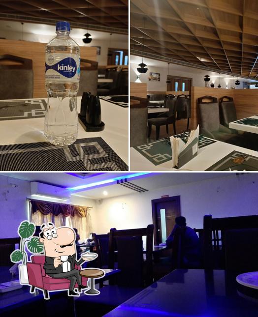 The photo of interior and beverage at Sri SR Restaurant