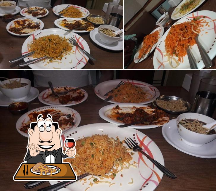 Pick pizza at GuruKripa Restaurant
