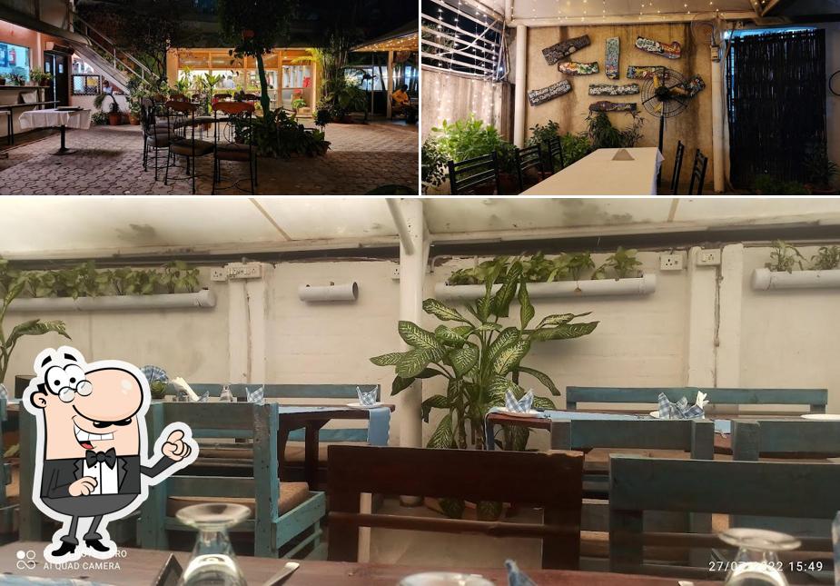 Take a seat at one of the tables at Pack 'N' Chew