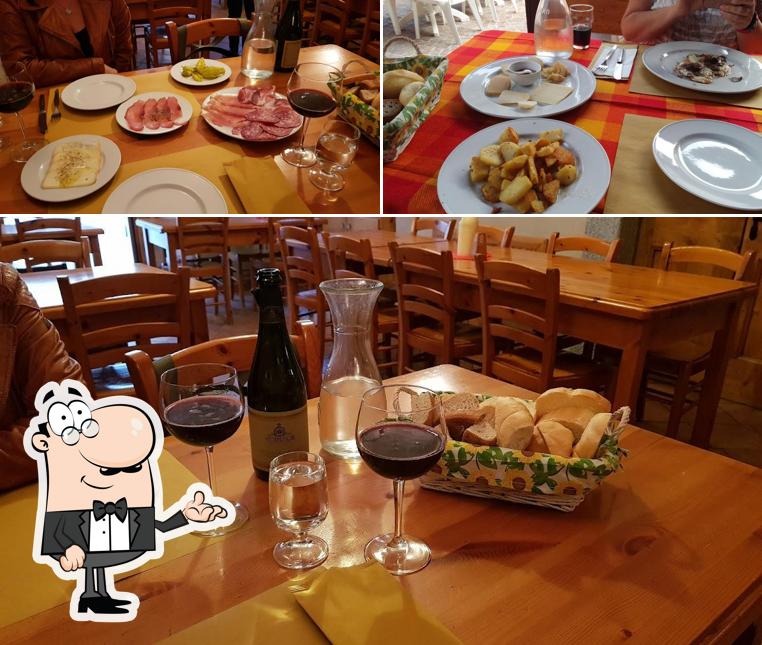 Siediti a un tavolo di Osteria Dei Magasi'