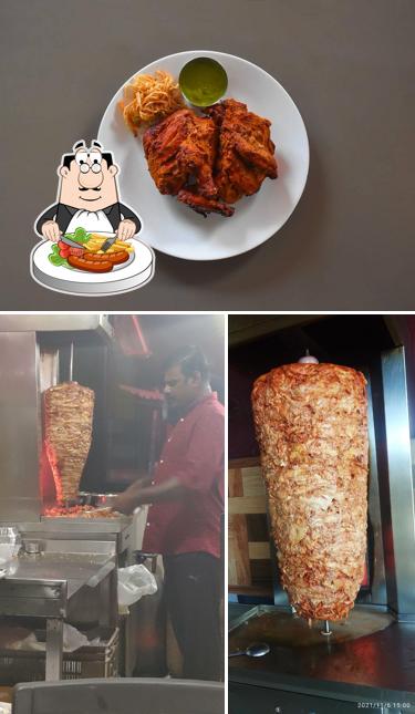 This is the picture showing food and interior at HOTEL AL-LAYALI
