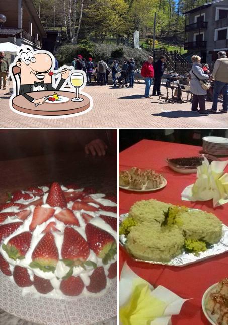 Questa è la immagine che mostra la cibo e esterno di Chamois d'or Montoso