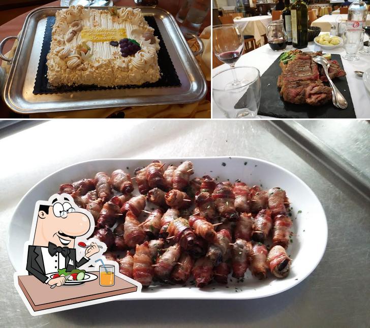 Guarda la foto che mostra la cibo e vino di Ristorante Hotel San Michele