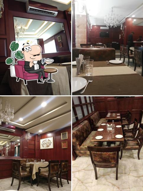 Take a seat at one of the tables at Fanooz Restaurant & Banquet Hall