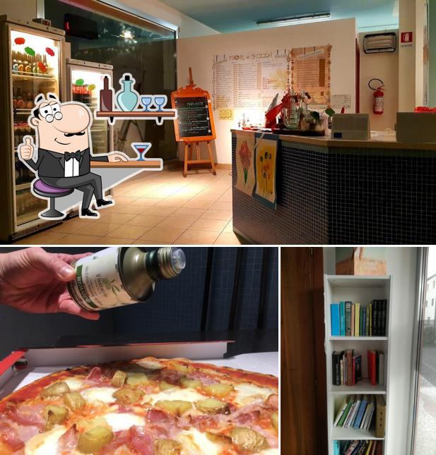 Guarda la immagine che presenta la interni e pizza di Fior Di Pizza - Pizzeria Per Asporto