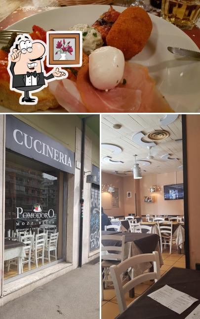 La foto della interni e cibo di Pomodoro e Mozzarella