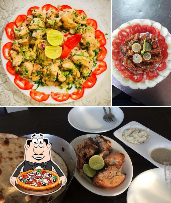 Get pizza at Abhi's Kitchen Club