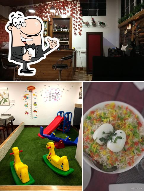 Look at the photo of The Hood Bar and Restaurant