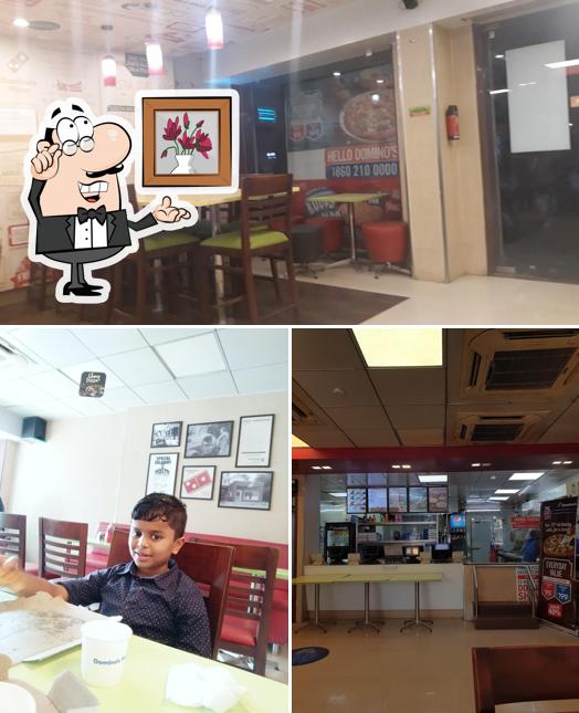 Take a seat at one of the tables at Domino's Pizza Palghar, Boisar